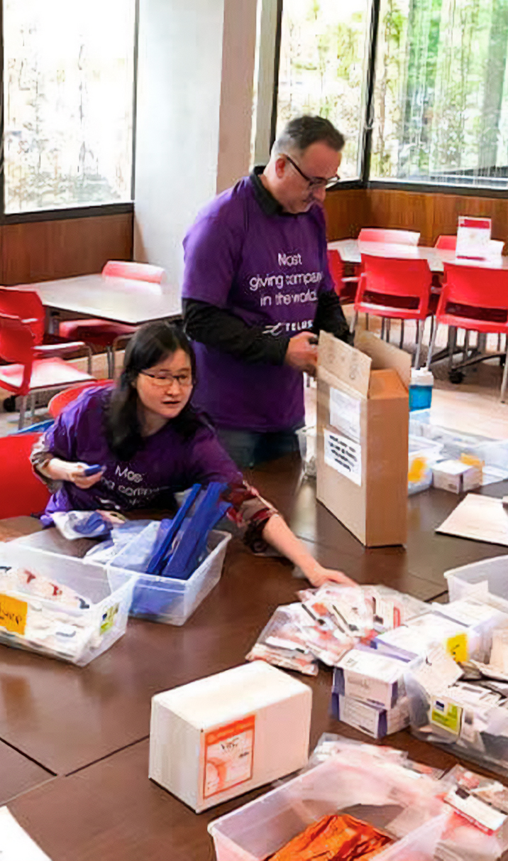 Image of volunteers making safer drug use supply kits